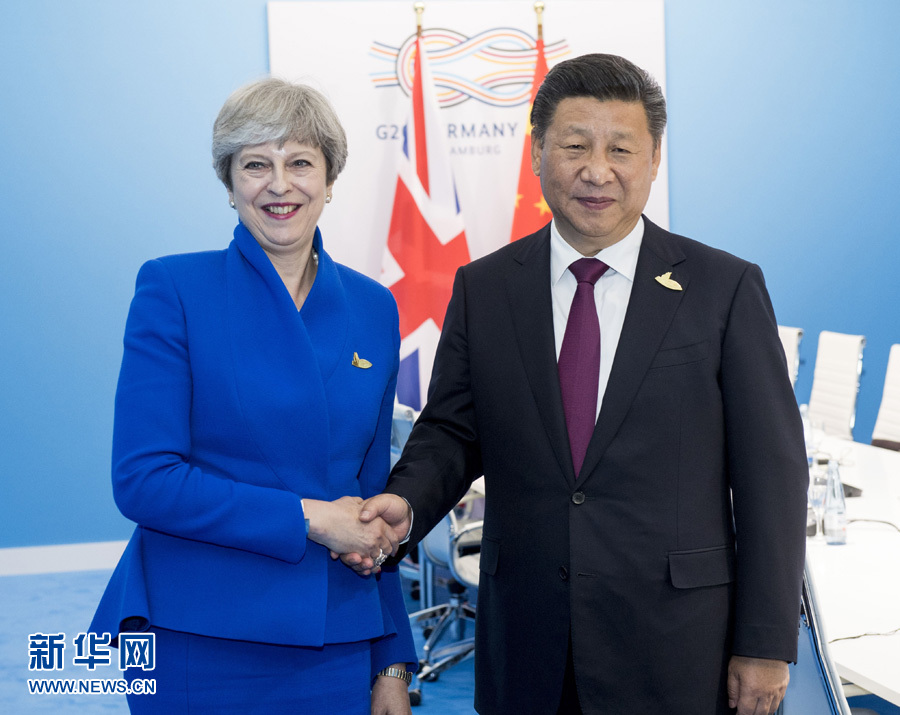 7月7日，國(guó)家主席習(xí)近平在漢堡會(huì)見(jiàn)英國(guó)首相特雷莎·梅。 新華社記者李學(xué)仁 攝